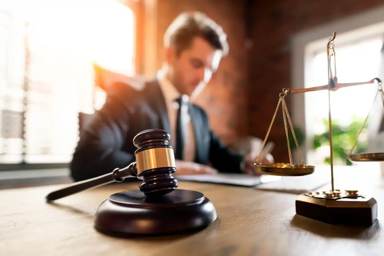 Judge’s gavel and scales of justice, representing tax fairness legislation for Americans abroad